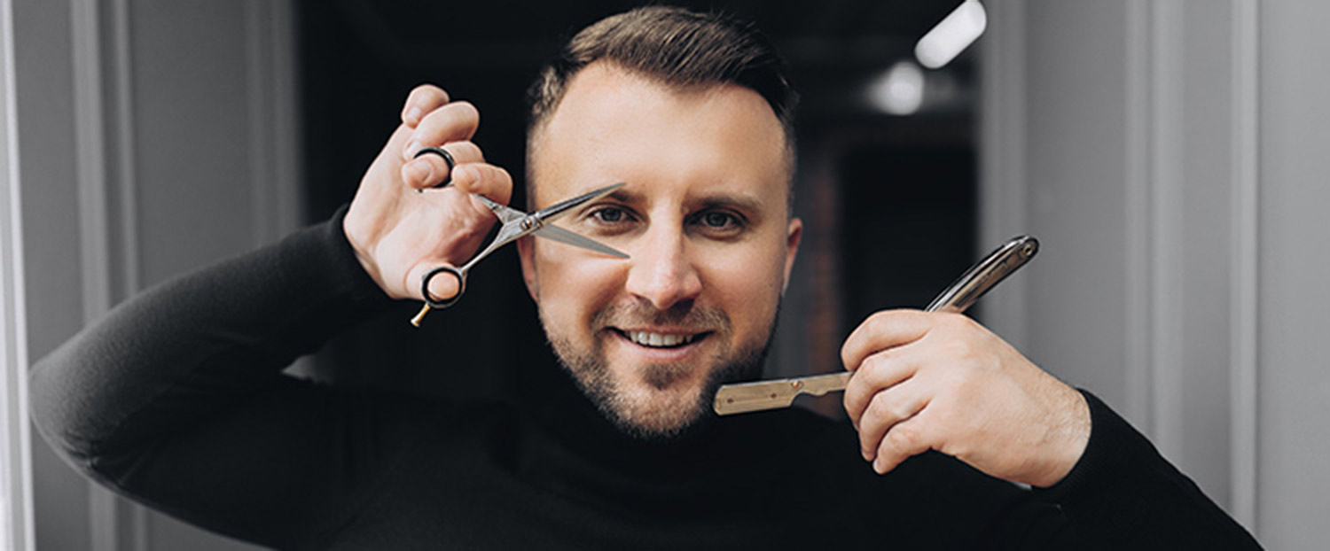 bearded-man Bild zeigt Mann mit Bart und Schere